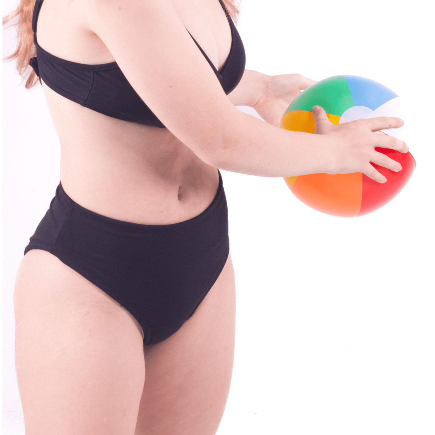 Teen in high waist high leg period-proof swimwear swimming confidently